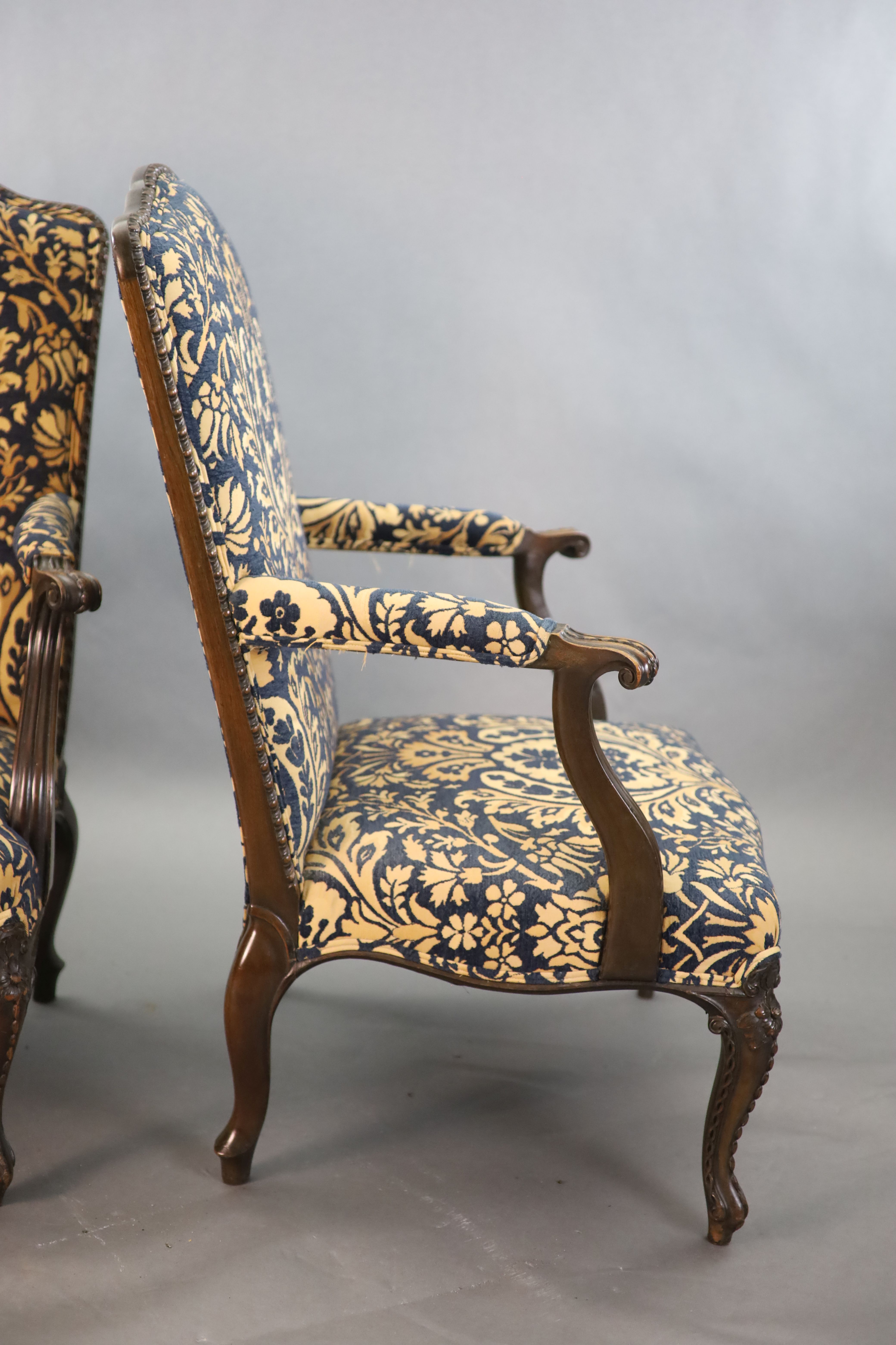 A pair of Louis XVI style mahogany fauteuils, W.2ft 6in. D.2ft 5in. H.3ft 6in.